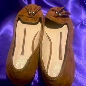 Brown loafers with tassels